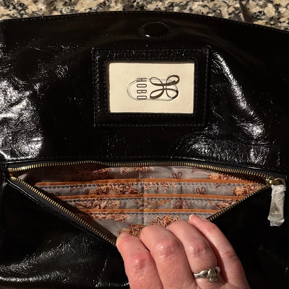 NWT HOBO Zeal Clutch Black Leather with Studded Detail